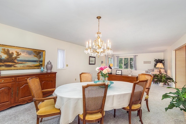859 Foxboro Rd, Saginaw, MI 48638 - dining room featuring light colored carpet and a chandelier