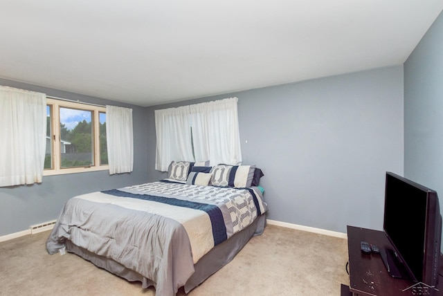 859 Foxboro Rd, Saginaw, MI 48638 - bedroom featuring carpet floors and baseboard heating