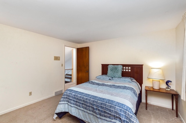 859 Foxboro Rd, Saginaw, MI 48638 - bedroom featuring light carpet
