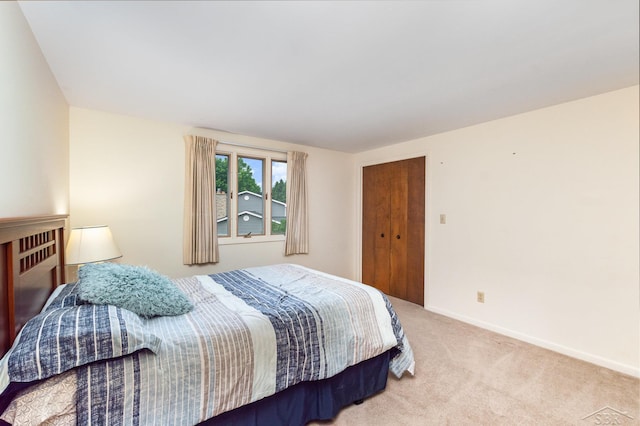 859 Foxboro Rd, Saginaw, MI 48638 - bedroom featuring carpet floors and a closet