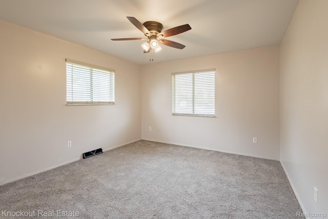 3782 Egan St, Saginaw, MI 48601 - carpeted spare room featuring healthy amount of natural light and a ceiling fan