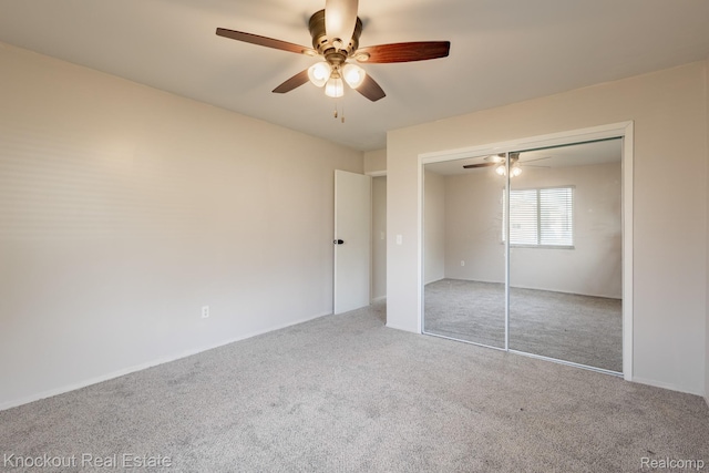3782 Egan St, Saginaw, MI 48601 - unfurnished bedroom featuring carpet floors, a closet, and a ceiling fan