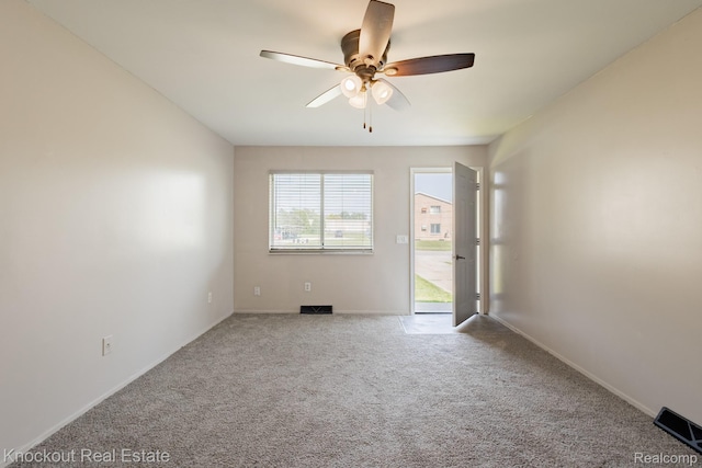 3782 Egan St, Saginaw, MI 48601 - carpeted empty room featuring a ceiling fan and baseboards