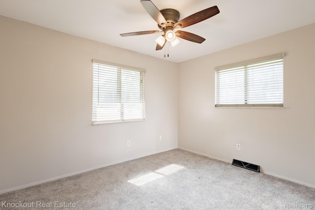 3782 Egan St, Saginaw, MI 48601 - empty room with a ceiling fan and carpet flooring