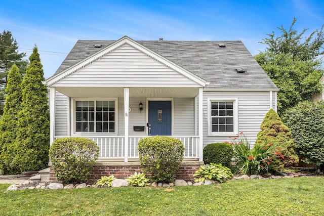 1018 S Stephenson Hwy, Royal Oak, MI 48067 - view of front of house featuring a porch, roof with shingles, and a front yard