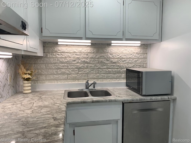 2245 S Walton Blvd Unit 58, Rochester Hills, MI 48309 - kitchen with black microwave, stainless steel dishwasher, decorative backsplash, and light countertops