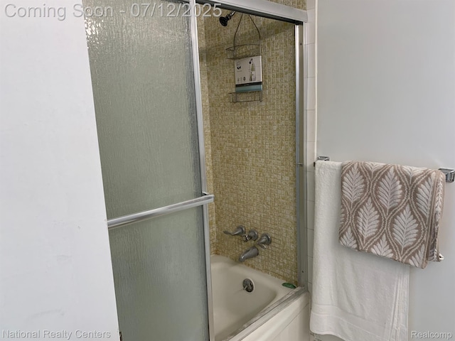 2245 S Walton Blvd Unit 58, Rochester Hills, MI 48309 - bathroom with enclosed tub / shower combo