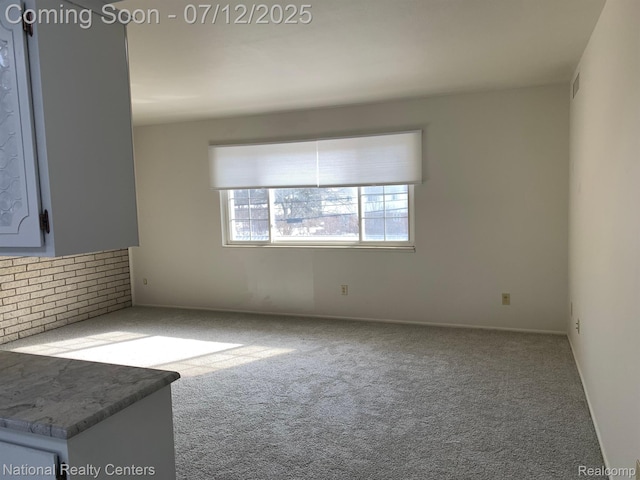 2245 S Walton Blvd Unit 58, Rochester Hills, MI 48309 - empty room with carpet flooring and baseboards