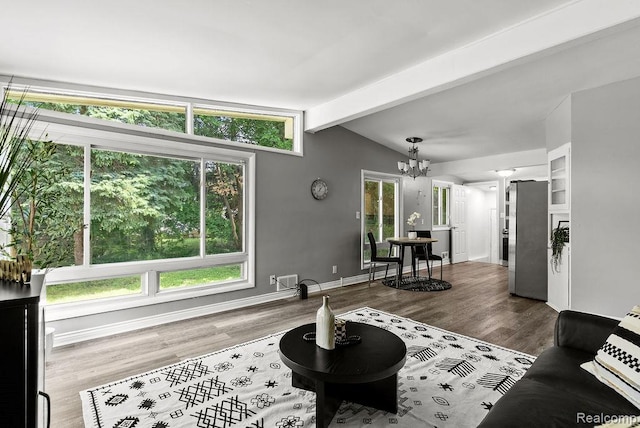 3818 Wisner St, Flint, MI 48504 - living room with a chandelier and wood finished floors