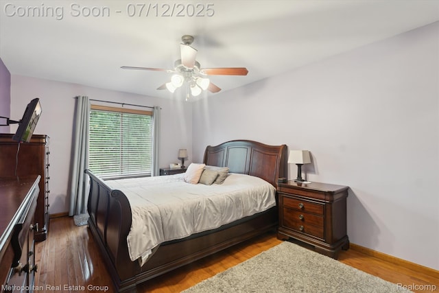 2129 Camelot Dr, Troy, MI 48083 - bedroom featuring wood finished floors and a ceiling fan