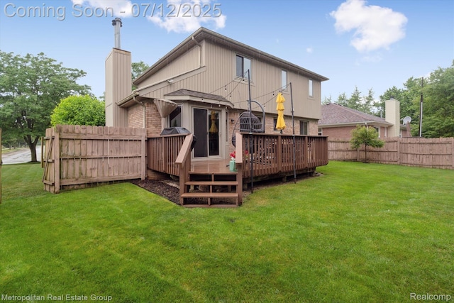 2129 Camelot Dr, Troy, MI 48083 - rear view of property with a deck, brick siding, and a chimney
