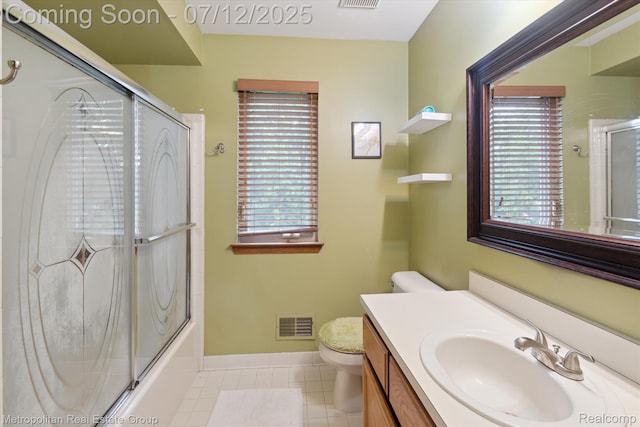 2129 Camelot Dr, Troy, MI 48083 - bathroom featuring vanity, bath / shower combo with glass door, and tile patterned floors