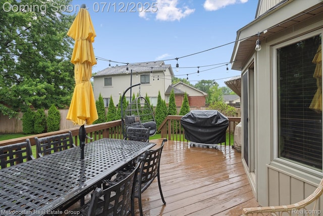 2129 Camelot Dr, Troy, MI 48083 - wooden terrace with outdoor dining space and a grill