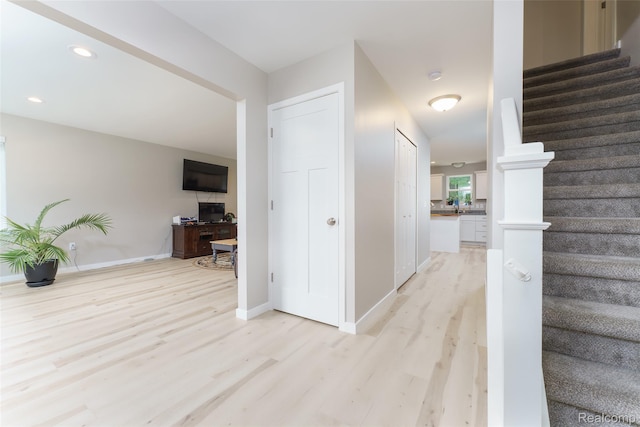11879 Secluded Ridge Dr, Byron, MI 48418 - staircase with wood finished floors and recessed lighting