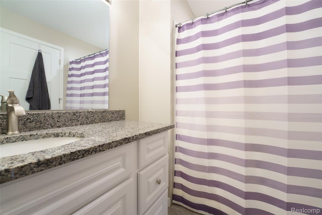 11879 Secluded Ridge Dr, Byron, MI 48418 - full bathroom with vanity and a shower with shower curtain