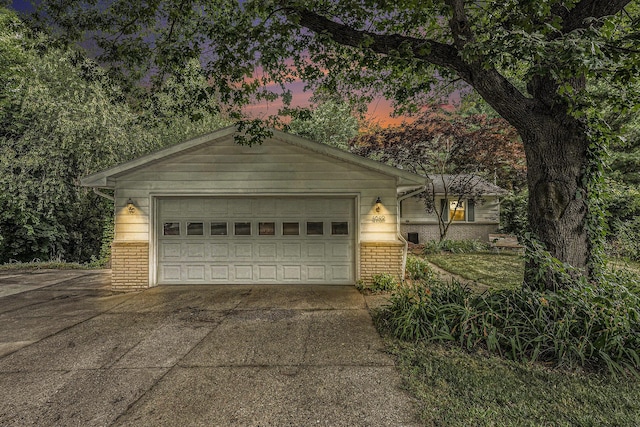 4649 Northview Ave NE, Grand Rapids, MI 49525 - ranch-style home with brick siding and a garage