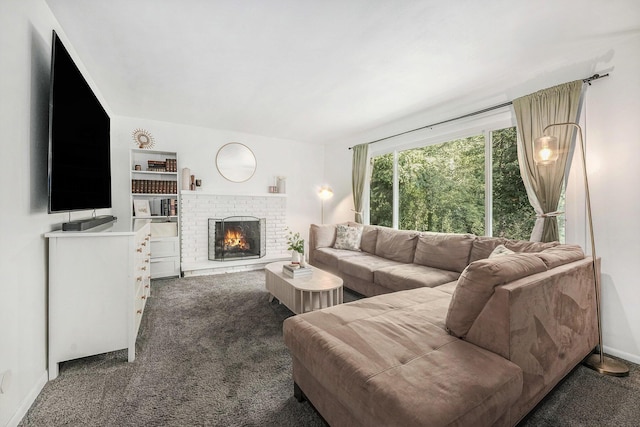 4649 Northview Ave NE, Grand Rapids, MI 49525 - carpeted living area featuring a brick fireplace and baseboards