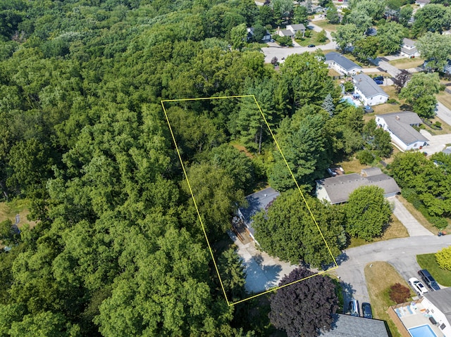 4649 Northview Ave NE, Grand Rapids, MI 49525 - aerial overview of property's location featuring a forest and property parcel outlined