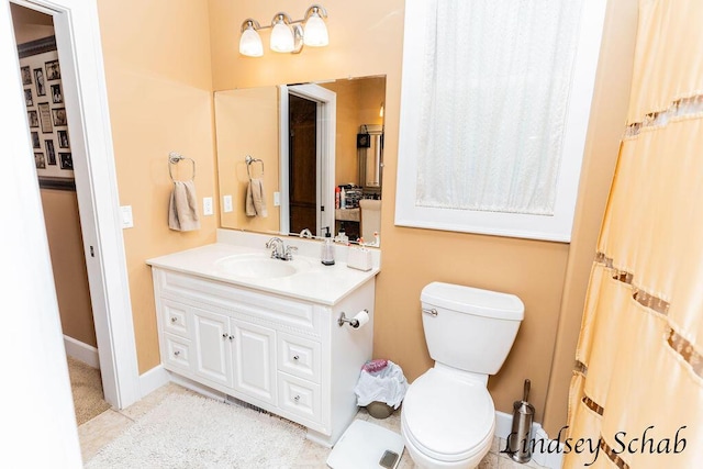 13025 Shaner Ave NE, Cedar Springs, MI 49319 - bathroom featuring vanity and toilet