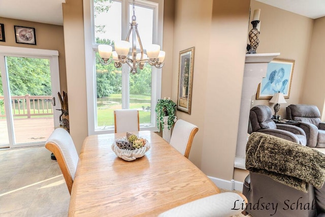 13025 Shaner Ave NE, Cedar Springs, MI 49319 - dining space with a chandelier and healthy amount of natural light