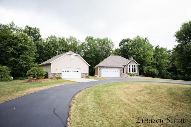 13025 Shaner Ave NE, Cedar Springs, MI 49319 - view of front facade featuring stone siding, a front yard, and a chimney