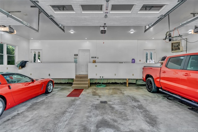 6728 Bowers Rd, Imlay City, MI 48444 - garage featuring a garage door opener