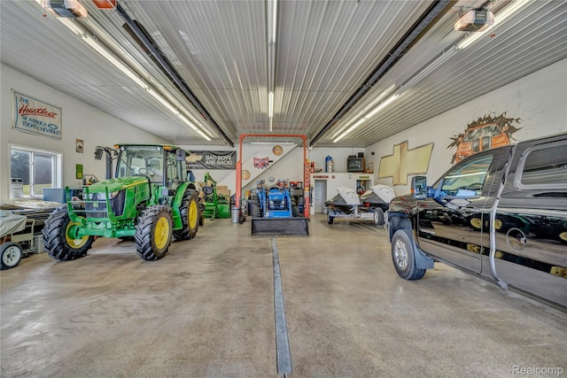 6728 Bowers Rd, Imlay City, MI 48444 - garage featuring a garage door opener