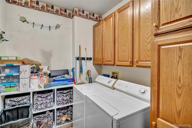 6728 Bowers Rd, Imlay City, MI 48444 - laundry room featuring washing machine and clothes dryer and cabinet space
