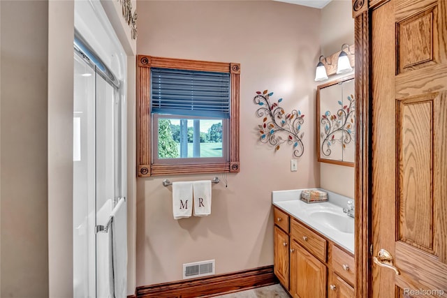 6728 Bowers Rd, Imlay City, MI 48444 - bathroom featuring vanity and baseboards