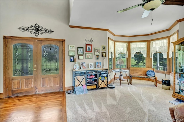 6728 Bowers Rd, Imlay City, MI 48444 - foyer with healthy amount of natural light, ceiling fan, ornamental molding, and wood finished floors