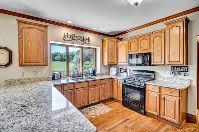 6728 Bowers Rd, Imlay City, MI 48444 - kitchen featuring black appliances, light wood-style floors, light stone countertops, ornamental molding, and recessed lighting