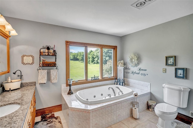 6728 Bowers Rd, Imlay City, MI 48444 - bathroom with double vanity, a jetted tub, and tile patterned floors