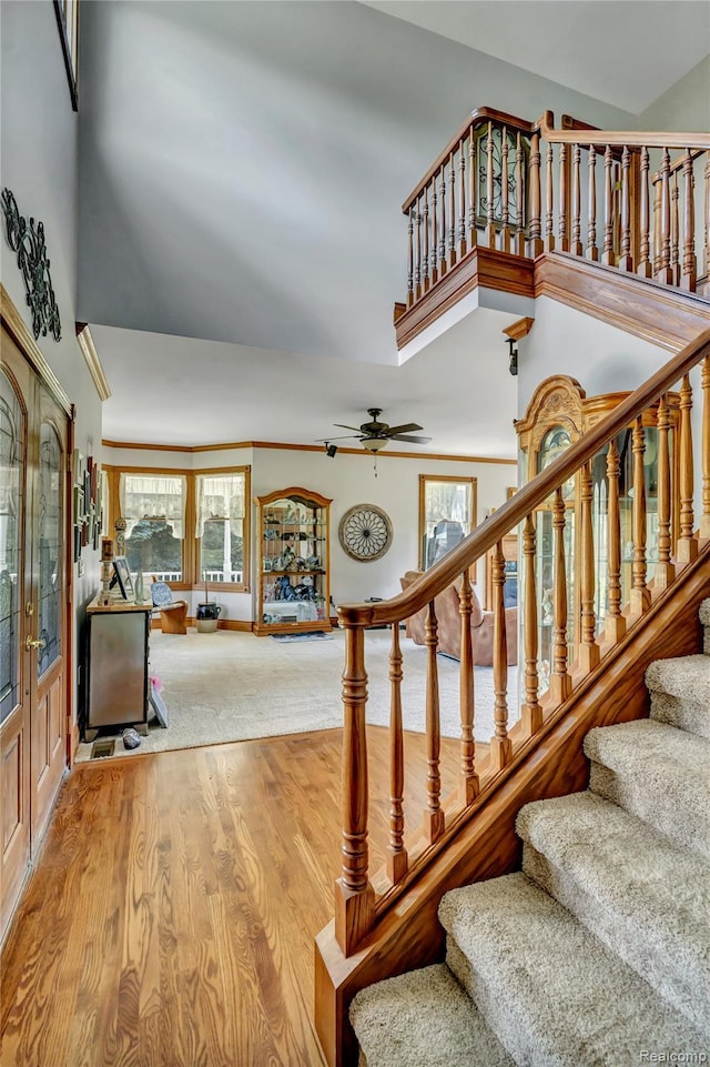 6728 Bowers Rd, Imlay City, MI 48444 - stairway featuring wood finished floors and a ceiling fan