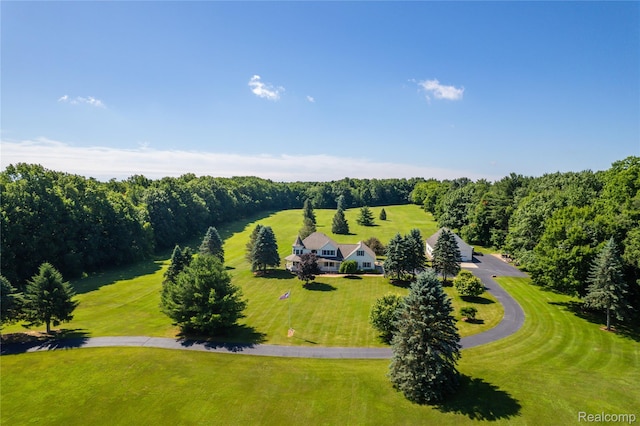 6728 Bowers Rd, Imlay City, MI 48444 - aerial view of property and surrounding area with a heavily wooded area