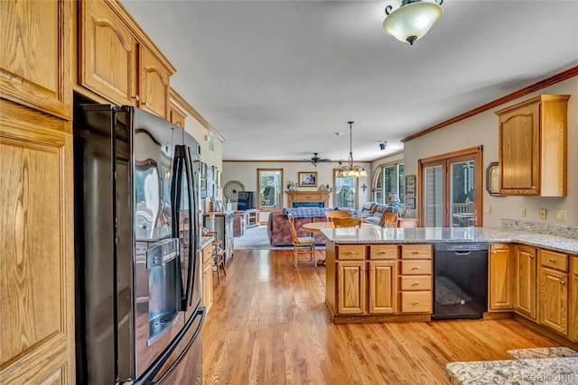 6728 Bowers Rd, Imlay City, MI 48444 - kitchen featuring black appliances, light wood-type flooring, a peninsula, open floor plan, and crown molding