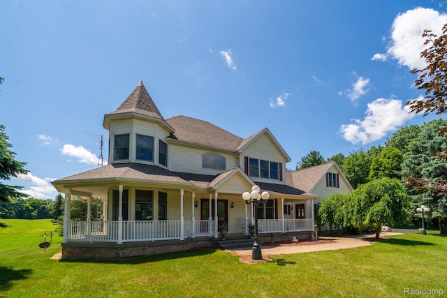 6728 Bowers Rd, Imlay City, MI 48444 - victorian-style house with covered porch, a front lawn, and a shingled roof