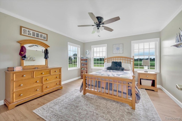 1647 Higley Rd, Lapeer, MI 48446 - bedroom with light wood finished floors, ornamental molding, multiple windows, and a ceiling fan