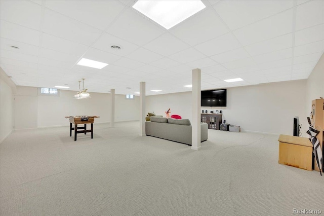 1647 Higley Rd, Lapeer, MI 48446 - carpeted living area with a paneled ceiling