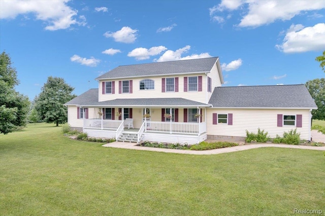 1647 Higley Rd, Lapeer, MI 48446 - colonial-style house featuring covered porch, a front lawn, and roof with shingles