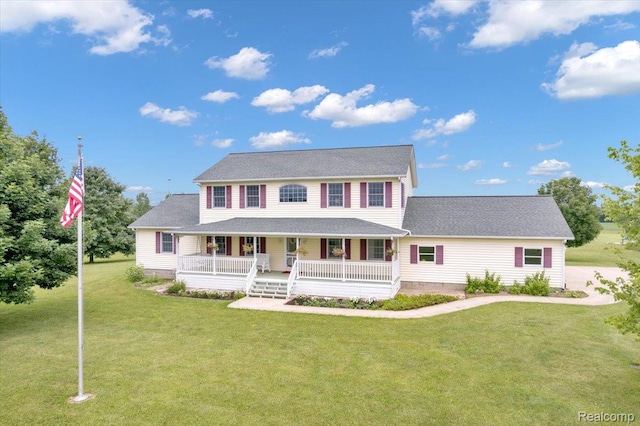 1647 Higley Rd, Lapeer, MI 48446 - colonial-style house with a porch, a front yard, and a shingled roof