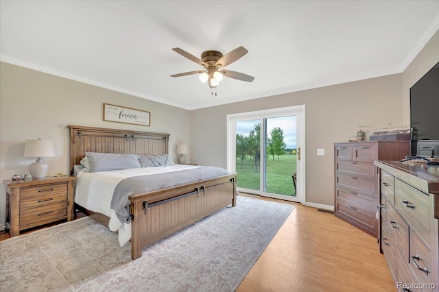 1647 Higley Rd, Lapeer, MI 48446 - bedroom featuring access to exterior, light wood-style floors, ornamental molding, and ceiling fan