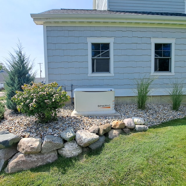 7229 Lakeview Ave, South Haven, MI 49090 - exterior view of a power unit and roof with shingles