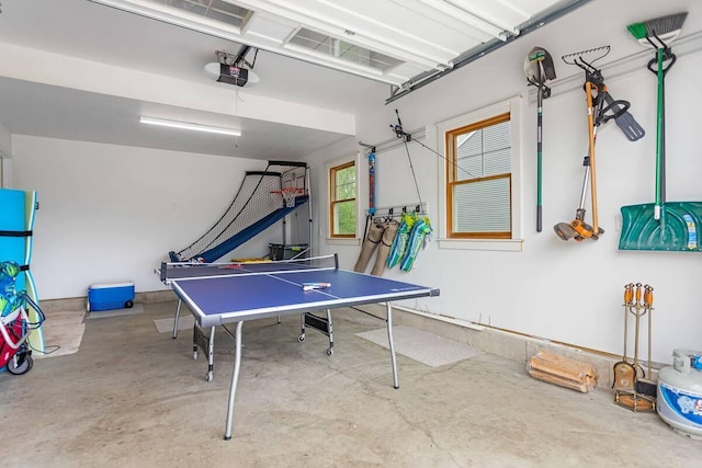 7229 Lakeview Ave, South Haven, MI 49090 - game room featuring a garage and unfinished concrete floors
