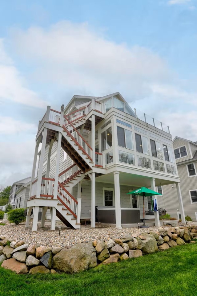 7229 Lakeview Ave, South Haven, MI 49090 - rear view of house with stairway and a balcony