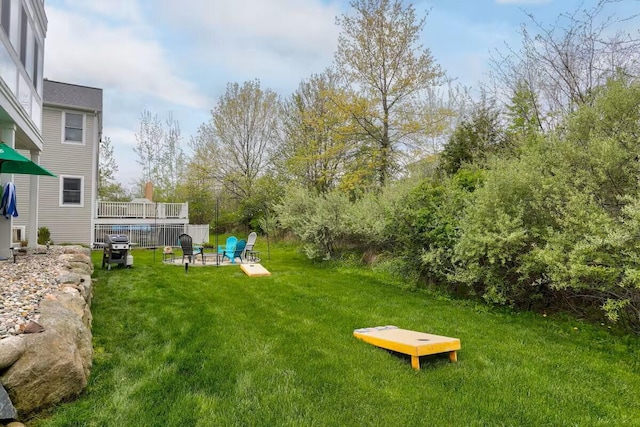 7229 Lakeview Ave, South Haven, MI 49090 - view of green lawn with an outdoor fire pit