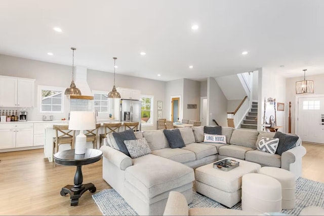 7229 Lakeview Ave, South Haven, MI 49090 - living area featuring stairway, light wood-style flooring, recessed lighting, and plenty of natural light