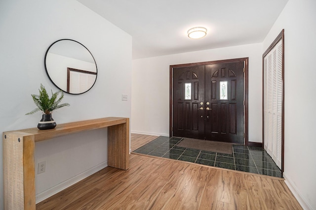 8411 Reese Ln, Ann Arbor, MI 48103 - entrance foyer featuring dark wood-style flooring