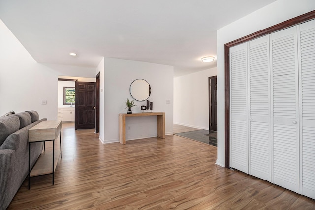8411 Reese Ln, Ann Arbor, MI 48103 - living area featuring wood finished floors and baseboards