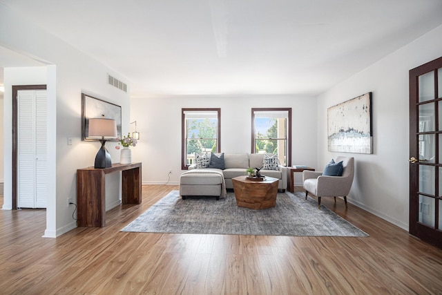 8411 Reese Ln, Ann Arbor, MI 48103 - living area with wood finished floors and baseboards