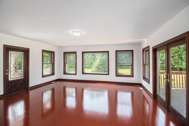 8411 Reese Ln, Ann Arbor, MI 48103 - entrance foyer with french doors and dark wood-style floors